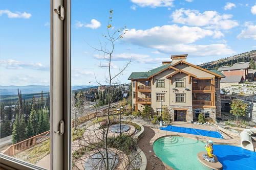 305/305A-255 Feathertop Way, Big White, BC - Outdoor With In Ground Pool With View