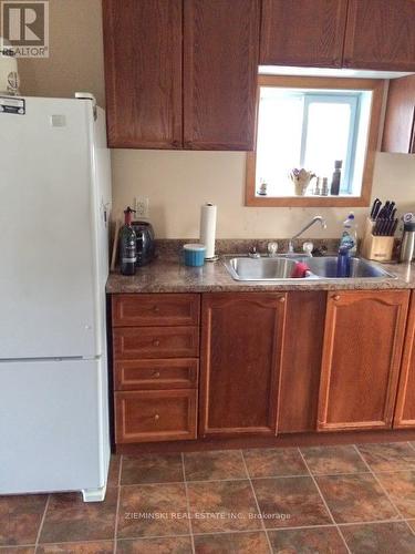 193 Teefy Street, Iroquois Falls, ON - Indoor Photo Showing Kitchen With Double Sink