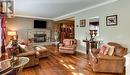 7835 Rysdale Street, Niagara Falls (213 - Ascot), ON  - Indoor Photo Showing Living Room With Fireplace 