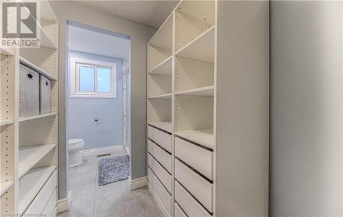 Walk in closet with custom shelving & drawers - 6 Fran Ellen Crescent, Kitchener, ON - Indoor With Storage