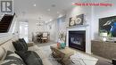 Th1 - 116 Evans Avenue, Toronto, ON  - Indoor Photo Showing Living Room With Fireplace 