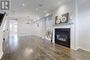 Th1 - 116 Evans Avenue, Toronto, ON  - Indoor Photo Showing Living Room With Fireplace 