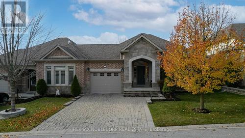 31 - 18 Upper Highland, New Tecumseth, ON - Outdoor With Facade