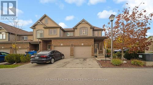 12 - 14 Amos Drive N, Guelph, ON - Outdoor With Facade