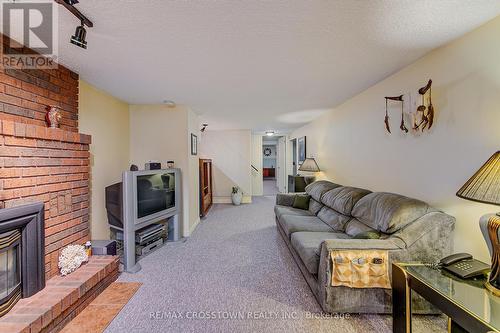 63 Bronte Crescent, Barrie, ON - Indoor Photo Showing Living Room With Fireplace