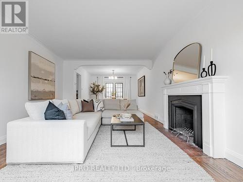 16 Elswick Road, Toronto, ON - Indoor Photo Showing Living Room With Fireplace