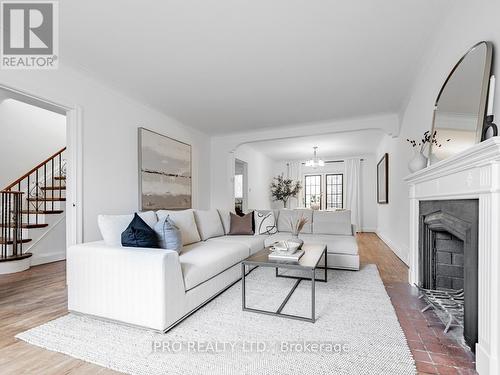 16 Elswick Road, Toronto, ON - Indoor Photo Showing Living Room With Fireplace