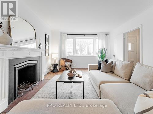 16 Elswick Road, Toronto, ON - Indoor Photo Showing Living Room With Fireplace