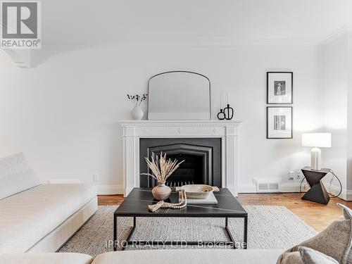 16 Elswick Road, Toronto, ON - Indoor Photo Showing Living Room With Fireplace