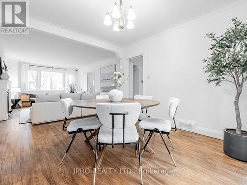 16 Elswick Road, Toronto, ON - Indoor Photo Showing Dining Room With Fireplace