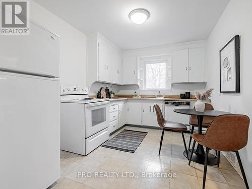 16 Elswick Road, Toronto, ON - Indoor Photo Showing Kitchen With Double Sink