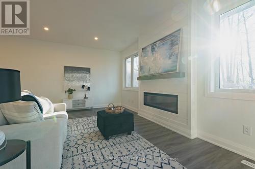 7 - 175 Glengariff Drive, Southwold (Talbotville), ON - Indoor Photo Showing Living Room With Fireplace