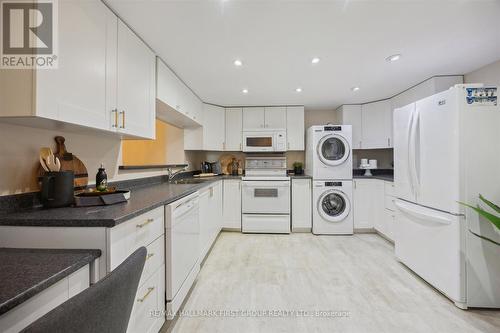 102 - 360 Watson Street W, Whitby (Port Whitby), ON - Indoor Photo Showing Laundry Room