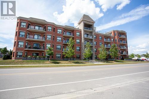 407 - 58 Glenelg Street, Kawartha Lakes (Lindsay), ON - Outdoor With Balcony With Facade