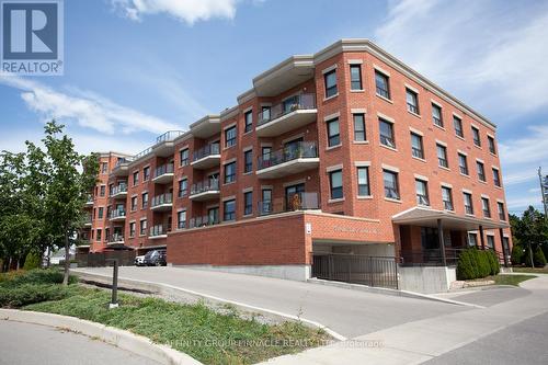 407 - 58 Glenelg Street, Kawartha Lakes (Lindsay), ON - Outdoor With Balcony With Facade