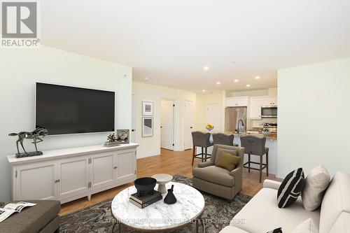 407 - 58 Glenelg Street, Kawartha Lakes (Lindsay), ON - Indoor Photo Showing Living Room