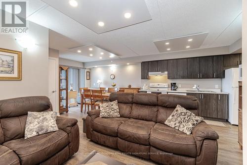 911 - 716 Main Street E, Milton, ON - Indoor Photo Showing Living Room