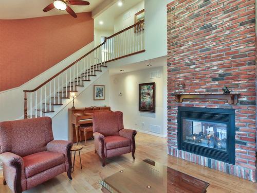 Living room - 147 Rue Maxime, Saint-Jean-Sur-Richelieu, QC - Indoor Photo Showing Living Room With Fireplace