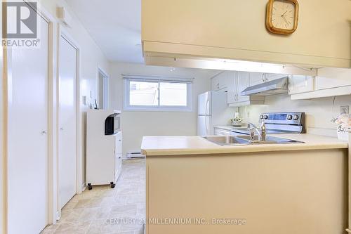 12 - 960 Warwick Court, Burlington, ON - Indoor Photo Showing Kitchen With Double Sink