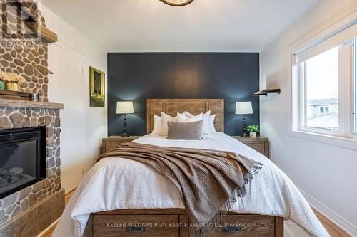 34 Corey Circle, Halton Hills, ON - Indoor Photo Showing Bedroom With Fireplace