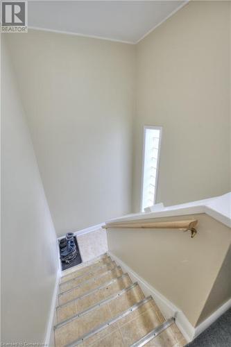 Stairs featuring tile patterned flooring - 524 Krug Street, Kitchener, ON - Indoor Photo Showing Other Room