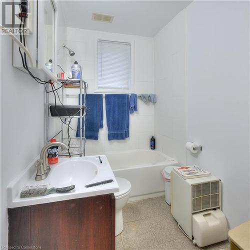 Full bathroom with shower / tub combination, vanity, and toilet - 524 Krug Street, Kitchener, ON - Indoor Photo Showing Bathroom