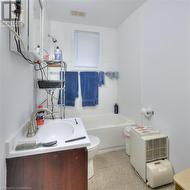 Full bathroom with shower / tub combination, vanity, and toilet - 