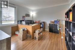 Office area featuring light wood-type flooring - 