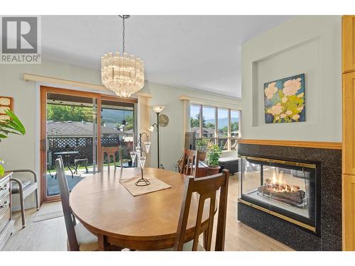 151 8 Avenue Sw Unit# 23, Salmon Arm, BC - Indoor Photo Showing Dining Room With Fireplace