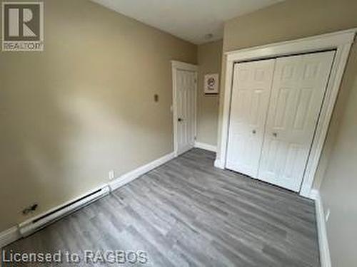 Unfurnished bedroom featuring a closet and hardwood / wood-style floors - 745 4Th Avenue East Avenue, Owen Sound, ON 