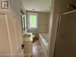 Full bathroom with vanity, independent shower and bath, and toilet - 