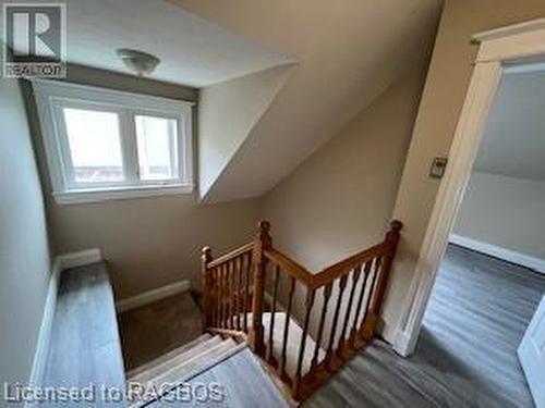 Stairs featuring hardwood / wood-style flooring and vaulted ceiling - 745 4Th Avenue East Avenue, Owen Sound, ON 