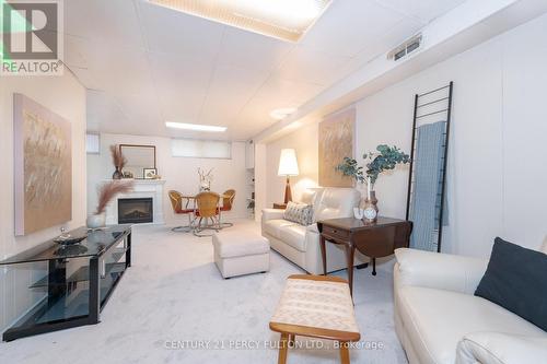 18 Corundum Crescent, Toronto, ON - Indoor Photo Showing Living Room With Fireplace