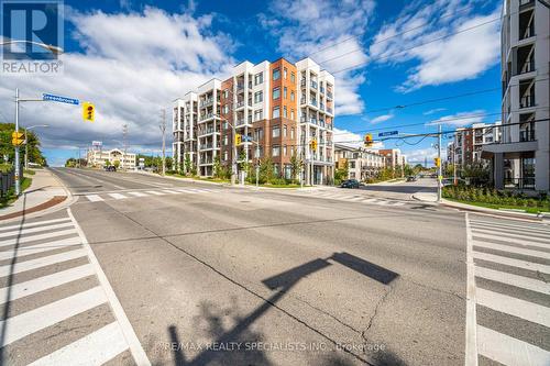 409 - 160 Canon Jackson Drive, Toronto, ON - Outdoor With Facade