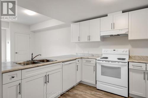 306 - 82 Munroe Street, Cobourg, ON - Indoor Photo Showing Kitchen With Double Sink