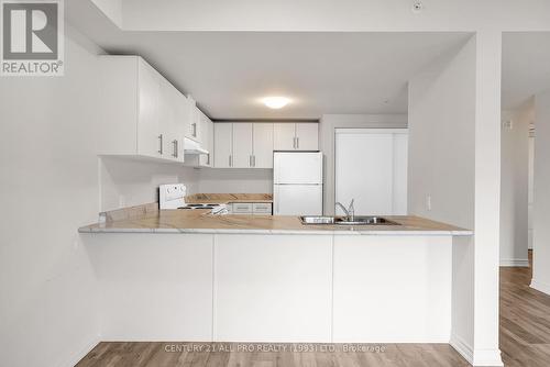 306 - 82 Munroe Street, Cobourg, ON - Indoor Photo Showing Kitchen With Double Sink