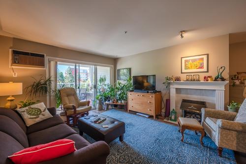 111-1445 Halifax Street, Penticton, BC - Indoor Photo Showing Living Room With Fireplace