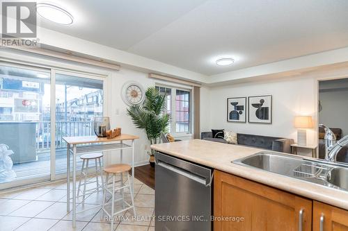 1 - 3032 Clayhill Road, Mississauga, ON - Indoor Photo Showing Kitchen With Double Sink