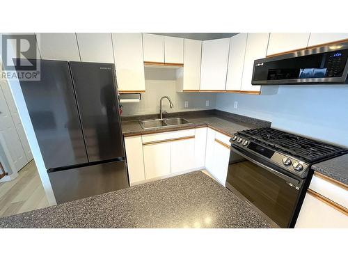 828 Oceanview Drive, Port Edward, BC - Indoor Photo Showing Kitchen With Double Sink