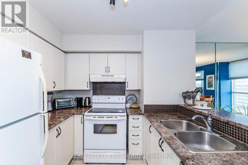 1502 - 140 Dunlop Street E, Barrie, ON - Indoor Photo Showing Kitchen With Double Sink