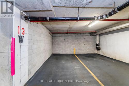 1502 - 140 Dunlop Street E, Barrie, ON - Indoor Photo Showing Garage