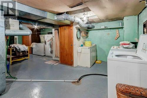 2440 24A Street Sw, Calgary, AB - Indoor Photo Showing Laundry Room