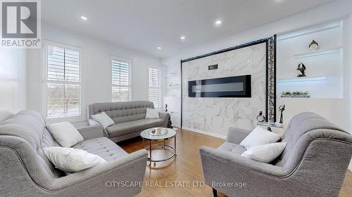 2026 Bridle Road, Oshawa, ON - Indoor Photo Showing Living Room With Fireplace