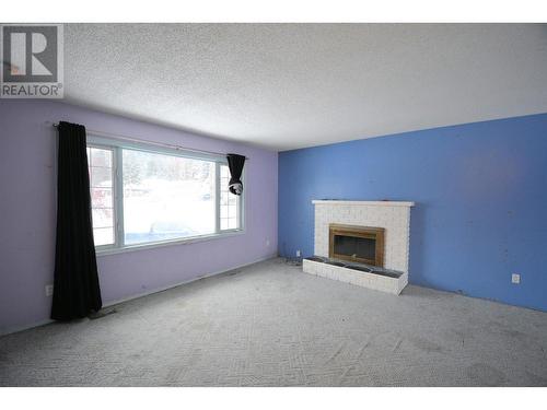 864 Blair Crescent, Prince George, BC - Indoor Photo Showing Living Room With Fireplace