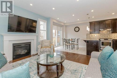 450 Hinton Terrace, Milton, ON - Indoor Photo Showing Living Room With Fireplace