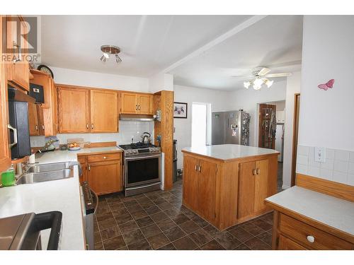 16020 Tupper Village Way, Dawson Creek, BC - Indoor Photo Showing Kitchen With Double Sink