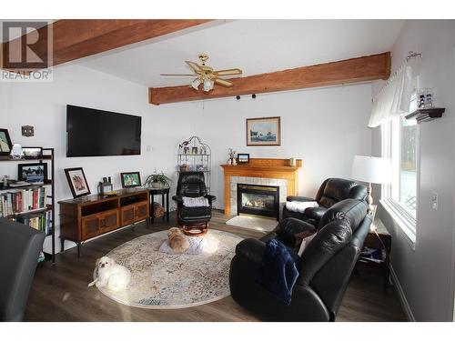 16020 Tupper Village Way, Dawson Creek, BC - Indoor Photo Showing Living Room With Fireplace