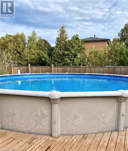 Seller Summer Picture of Backyard - 6 Vine Road, Grimsby, ON - Outdoor With Above Ground Pool With Backyard