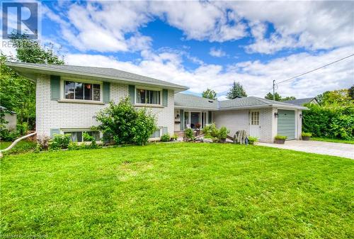 Split level home featuring a front yard and a garage - 8 Gerrard Avenue, Cambridge, ON - Outdoor