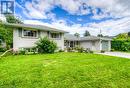 Split level home featuring a front yard and a garage - 8 Gerrard Avenue, Cambridge, ON  - Outdoor 